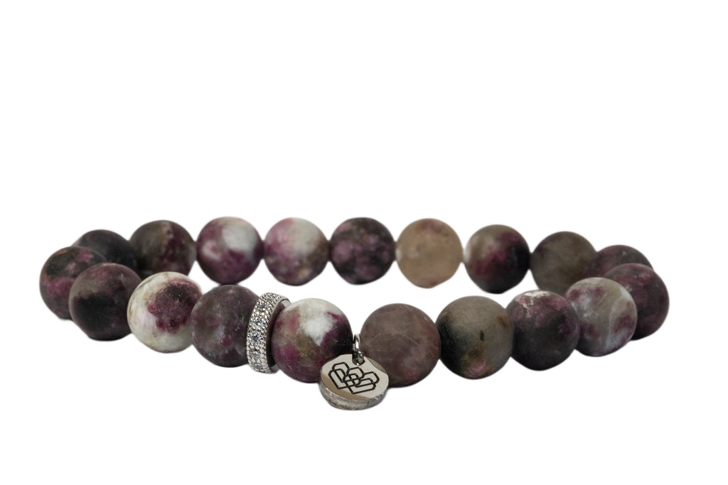 Image showing a 10mm matte plum blossom tourmaline bead bracelet with a silver cubic zirconia spacer.