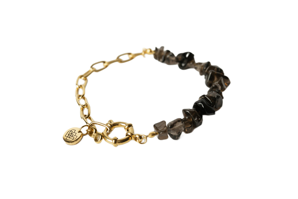 Elevate your energy with our Smokey Quartz 14K gold linked bracelet, a powerful guardian fostering strength, positive thoughts, and transformative vibes for a fear-free journey towards your dreams.