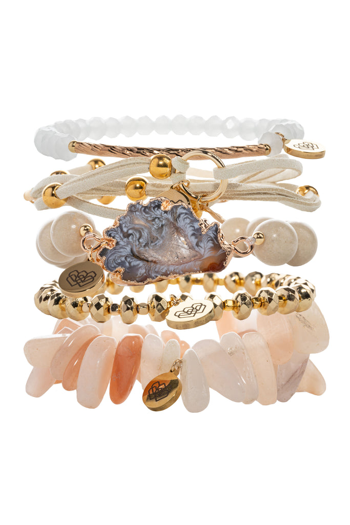 This Love is Always Kind Bracelet Collection is a unique and beautiful set of five bracelets with gold tones, soft pink, and off-white textures, made of Aventurine, Fossil wood, and agate for balance and healing.