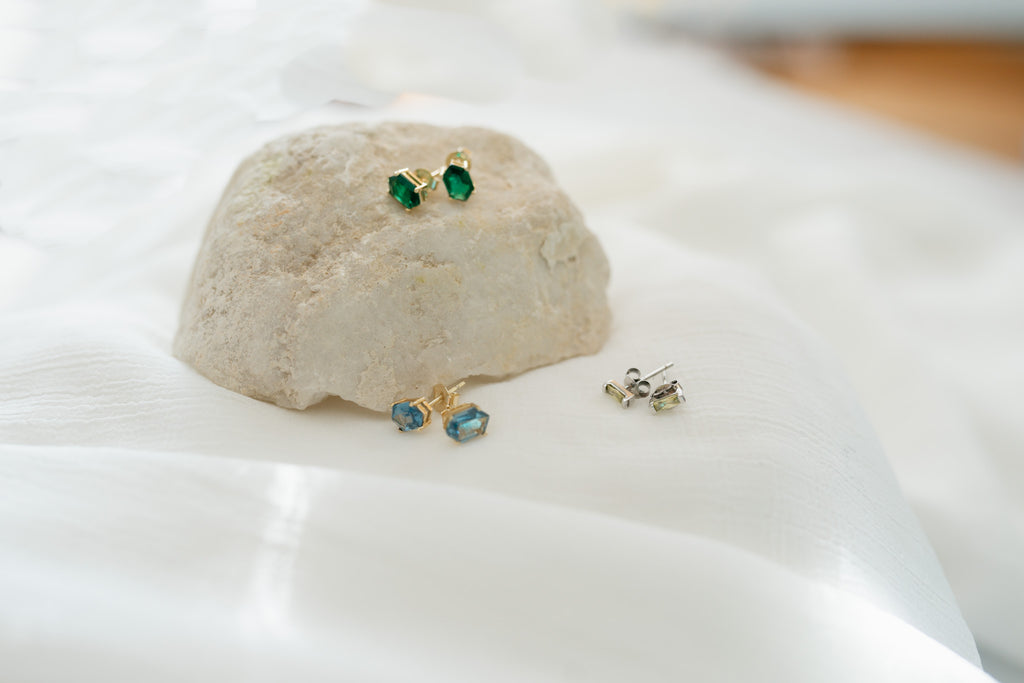 sterling silver dainty cubic zirconia studs in emerald green, aqua blue and light olive