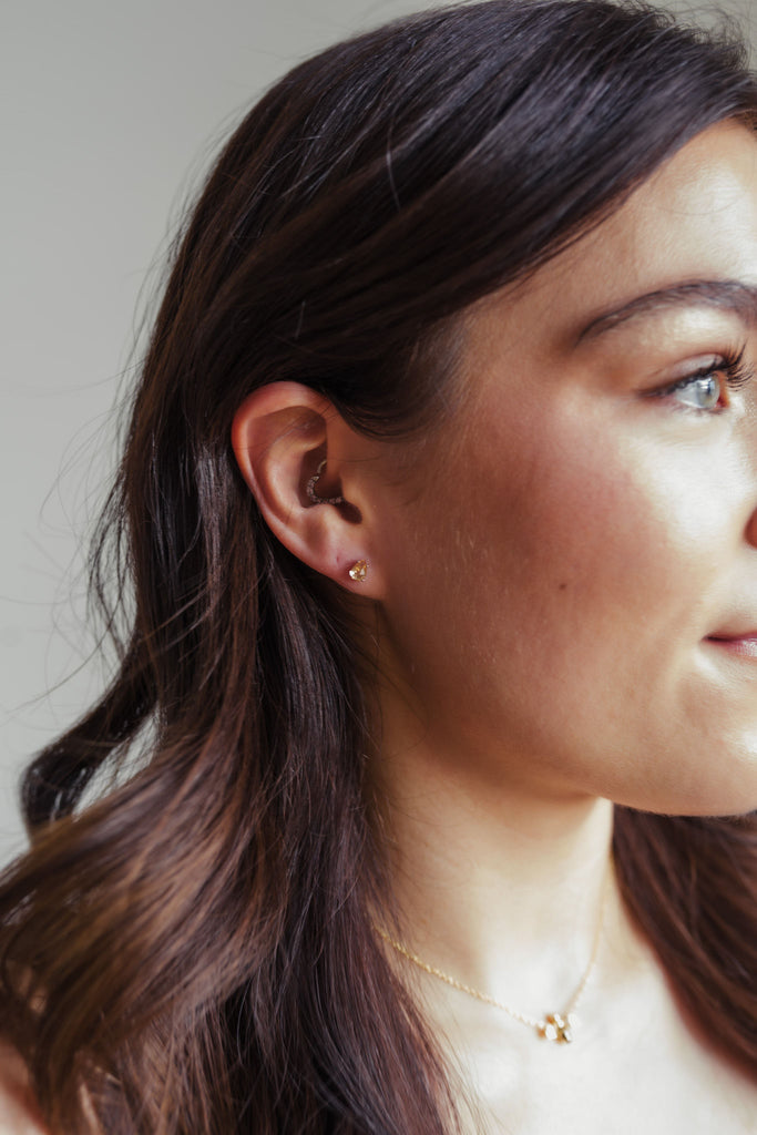 Genuine 925 sterling silver earrings with radiant Champagne Tourmaline gems, known for their sheen and fear-alleviating properties