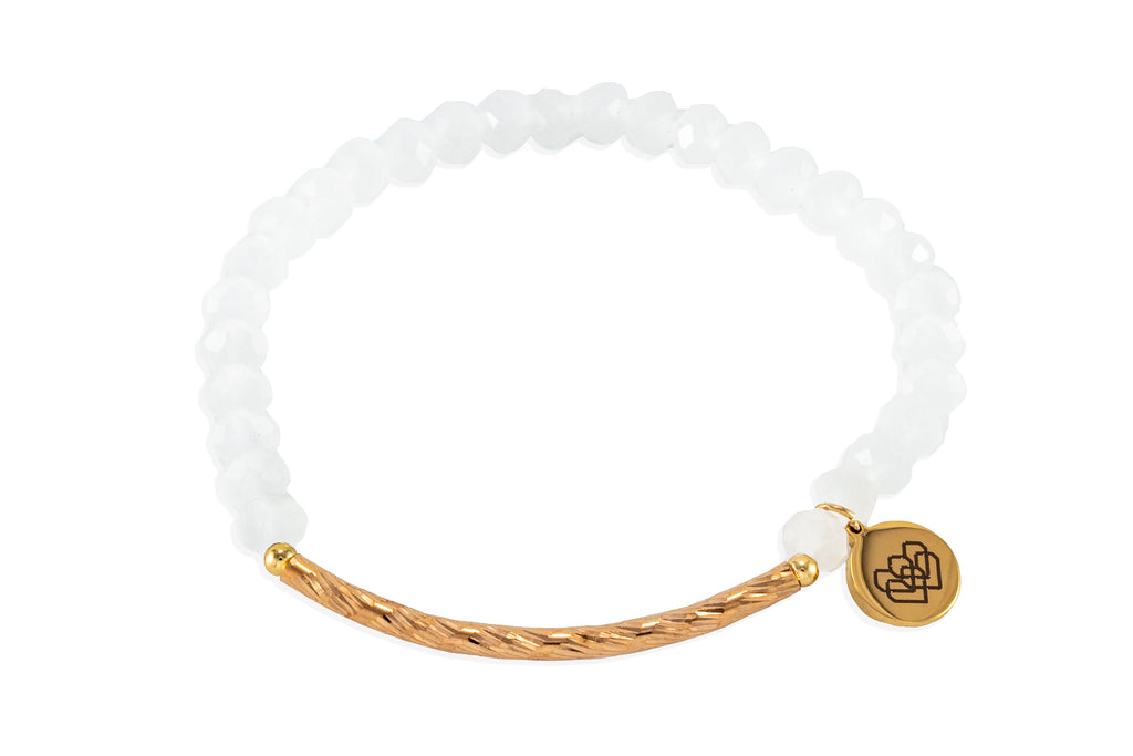  Evoke the timeless grace of Aphrodite with this exquisite glass bracelet and gold-plated brass connector.