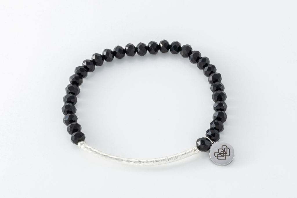 Silver plated brass tube connector and faceted obsidian black glass bead bracelet