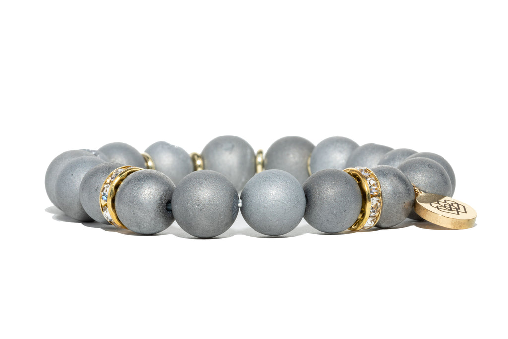 The classic rhinestones, gold accents and shimmery oversized druzy beads will help you tap into greater powers of focus.