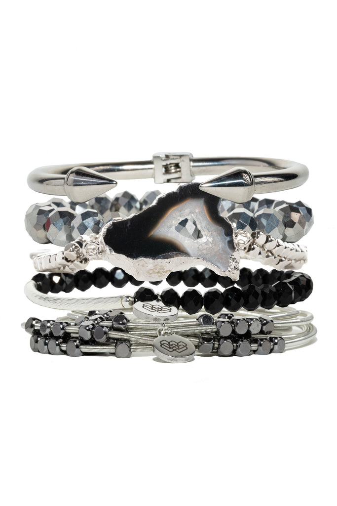 Cultivating Self-Control Bracelet Stack, crafted with iridescent glass beads, agate, and multifaceted stones with silver and black accents.